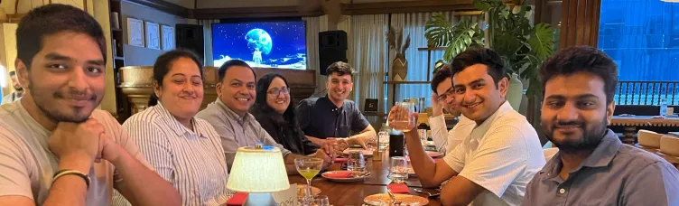 A group gathered around a table during the VC Fellowship meetup with Anup Jain
