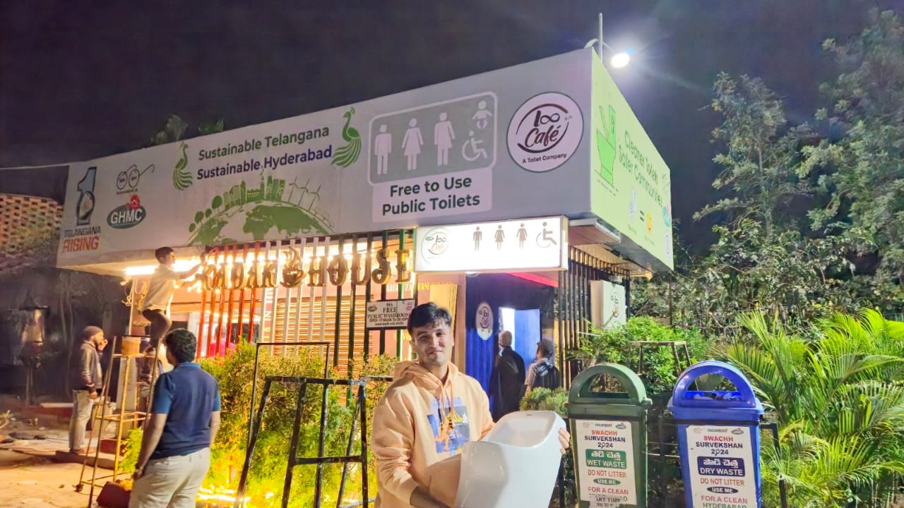 An evening outside a Loo Café public sanitation facility