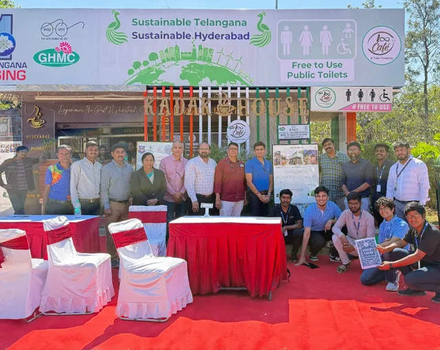 Group gathered outside a Loo Café facility